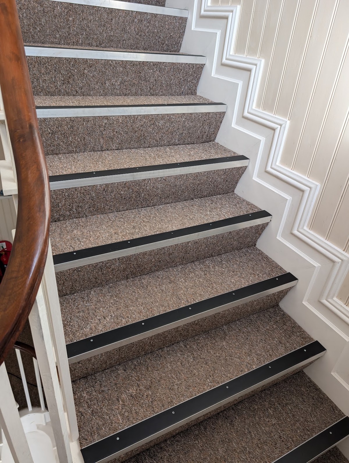 A freshly cleaned carpeted staircase